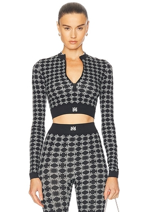 Amiri Quad Seamless Half Zip Top in Black - Black. Size XS/S (also in ).