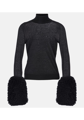 Alaia Faux fur-trimmed wool turtleneck top