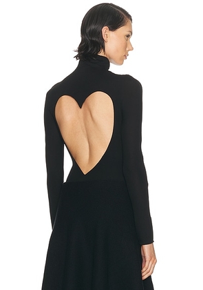 ALAÏA Heart Bodysuit Top in Noir Alaia - Black. Size 38 (also in ).