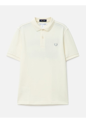 CDG SHIRT X FRED PERRY SS POLO W 'FREEDOM IS ENERGY'