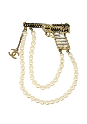 CHANEL Pre-Owned 2001 gun-motif brooch - Gold
