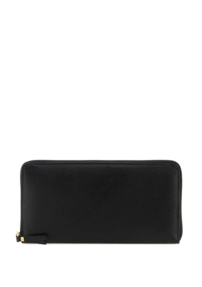 Comme Des Garçons Wallet logo-embossed leather wallet - Black