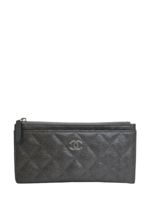 CHANEL Pre-Owned 2018-2019 Quilted Lambskin Camellia Zip Pouch long wallets - Grey