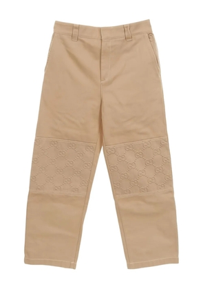 Gucci Pre-Owned 2010s embossed pattern denim trousers - Neutrals