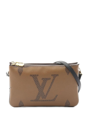 Louis Vuitton Pre-Owned 2021s Monogram Giant Reverse Double Zip Pochette shoulder bag - Brown