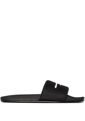 Alexander Wang logo-print flat slides - Black