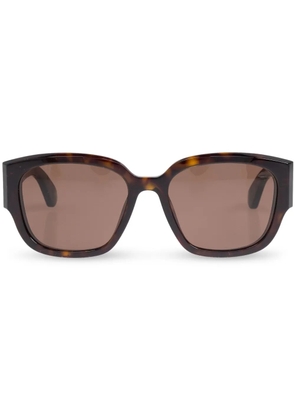 Alexander McQueen Eyewear engraved-logo arm sunglasses - Brown
