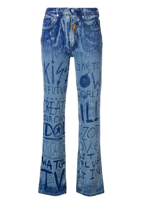 Walter Van Beirendonck Pre-Owned ink writing jeans - Blue