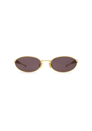 Bottega Veneta Sardine Sunglasses in Metallic Gold.