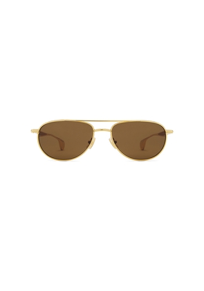 Bottega Veneta Fin Sunglasses in Metallic Gold.