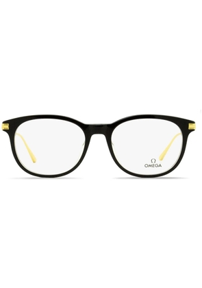 OMEGA EYEWEAR round-frame engraved-logo glasses - Black