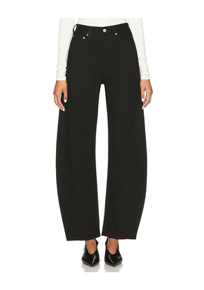 AGOLDE Luna Pieced Jeans in Black. Size 23. Also in 24, 25, 26, 27.