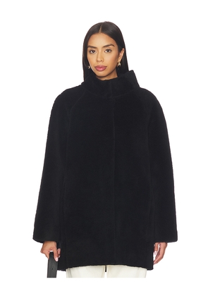 AEXAE Shearling High Neck Mid Length Jacket in Black. Size M. Also in L, S, XS.