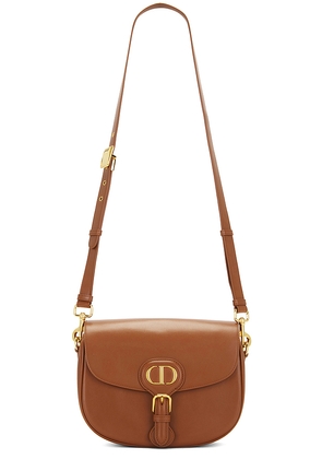 FWRD Renew Dior Bobby Bag in Brown.