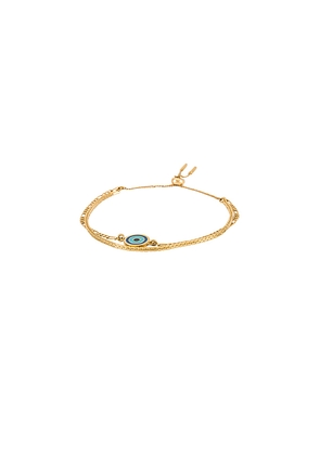 Jenny Bird Evil Eye Bracelet in Metallic Gold.