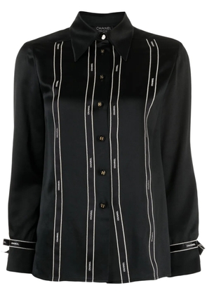 CHANEL Pre-Owned 1994 logo-tape silk blouse - Black