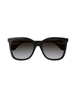 Gucci Mini Running Cat Eye Sunglasses in Black.