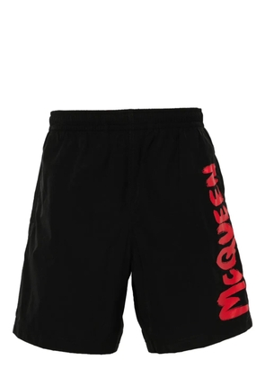 Alexander McQueen McQueen Garffiti-print swim shorts - Black