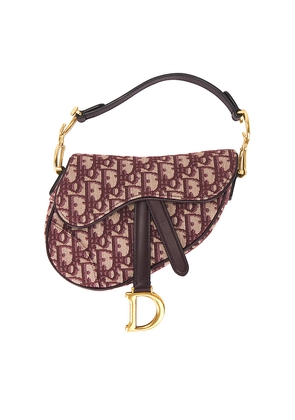 FWRD Renew Dior Oblique Trotter Mini Saddle Bag in Red.