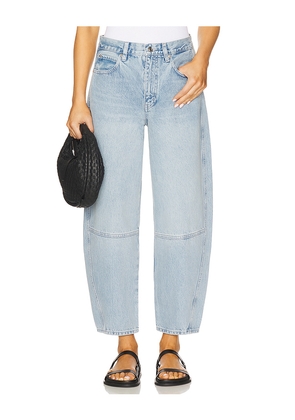 FRAME The Twisted Jeans in Blue. Size 24. Also in 26, 29.