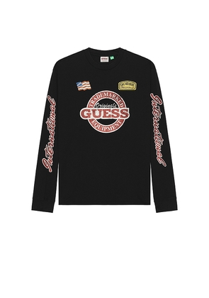 Guess Originals Race Long Sleeve Tee in Black. Size L. Also in M, S, XL/1X.