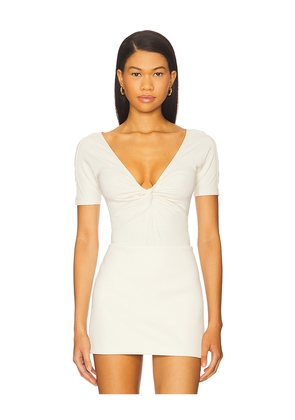 Good American Jersey Twist Front Bodysuit in Ivory. Size L. Also in M, XL/1X, XXL/2X, XXXL/3X, XXXXL/4X.