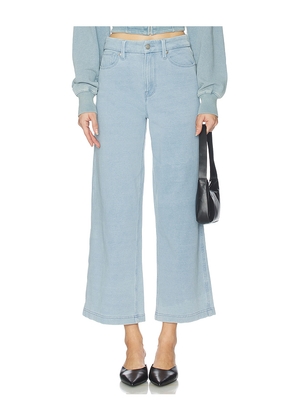 Good American Jeanius Cropped Good Skate in Blue. Size 0. Also in 00, 10, 12, 14, 16, 18, 2, 20, 22, 4, 6, 8.