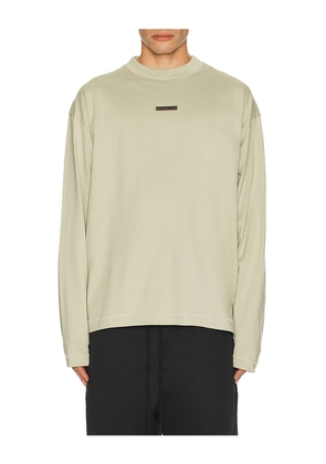 Fear of God ESSENTIALS Classic Fit Long Sleeve Tee in Grey. Size L. Also in M, XL/1X.
