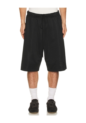 Fear of God ESSENTIALS Relaxed Sweatshort in Black. Size L. Also in M, S, XL/1X, XS, XXL/2X.