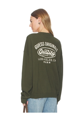 Guess Originals Back Jacquard Sweater in Dark Green. Size L. Also in M, S, XL/1X, XS.