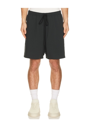 Fear of God ESSENTIALS Classic Short in Black. Size L. Also in M, S, XL/1X, XS, XXL/2X.