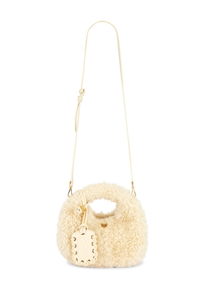 Ganni Mini Fur Hobo Bag in Cream.