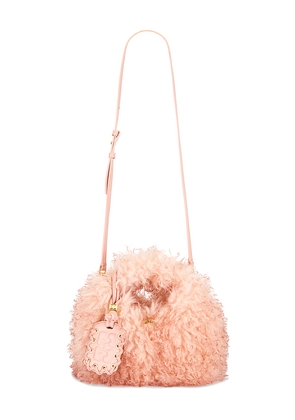 Ganni Mini Fur Hobo Bag in Pink.