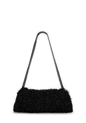 Norma Kamali Muff Bag in Black.