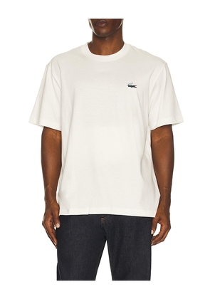 Lacoste Heavy Jersey Landscape Crocodile Print T-shirt in White. Size 3. Also in 4, 5, 6, 7.