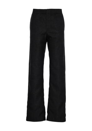 Prada Pre-Owned triangle-logo trousers - Black