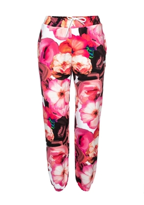 MSGM pre-owned floral-print trousers - Pink