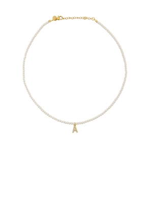 petit moments Initial Pearl Necklace in Metallic Gold. Size B. Also in F, I.