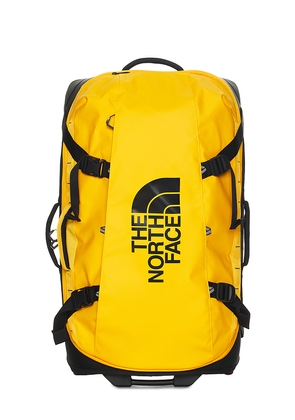 The North Face Base Camp Rolling Thunder 28' in Metallic Gold.
