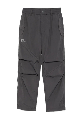 izzue logo-printed pants - Grey