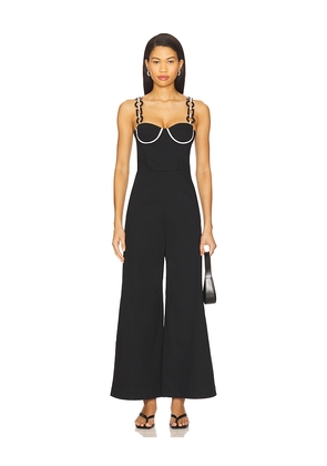 Saudade Charm Jumpsuit in Black. Size M. Also in S, XS.