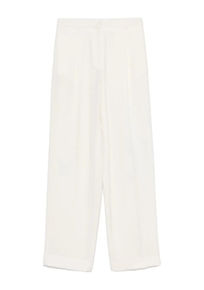 A.M.G. pleat-detailed trousers - White