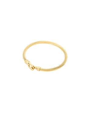 petit moments Bit Tension Cuff in Metallic Gold.