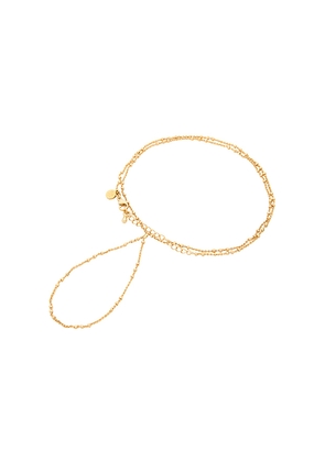 petit moments Dainty Hand Chain in Metallic Gold.