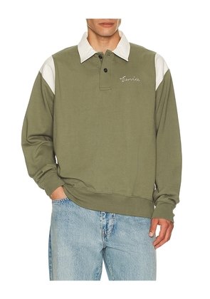 Service Works Bistrot Polo in Olive. Size L. Also in M, S, XL/1X.