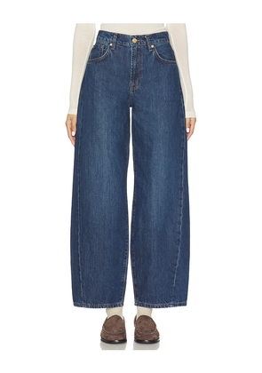 7 For All Mankind Twisted Bonnie Horseshoe Jeans in Blue. Size 23. Also in 26, 27, 28, 29, 30, 31, 32, 33.