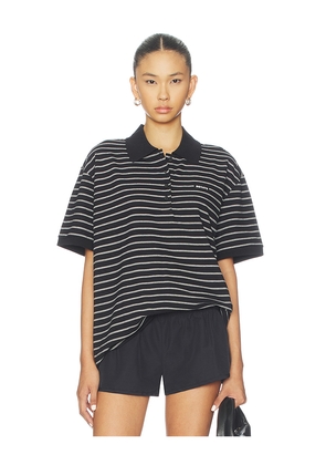 ROTATE Pique Short Sleeve Polo in Black. Size L. Also in M, S, XL, XS.