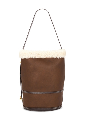 Polo Ralph Lauren Shearling & Tumbled Leather Sling Bucket Bag Medium in Brown.