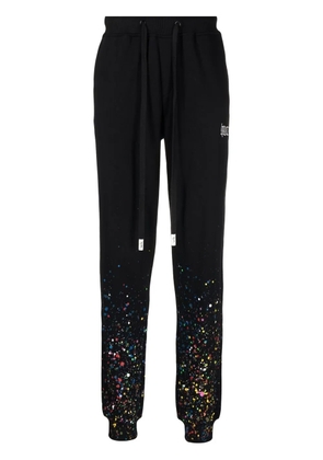 Haculla paint splatter track pants - Black