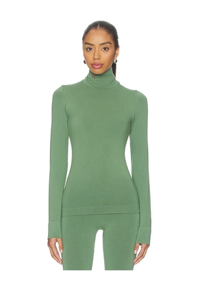 Perfect Moment Perfect Thermal Rollneck in Green. Size L. Also in S, XS.